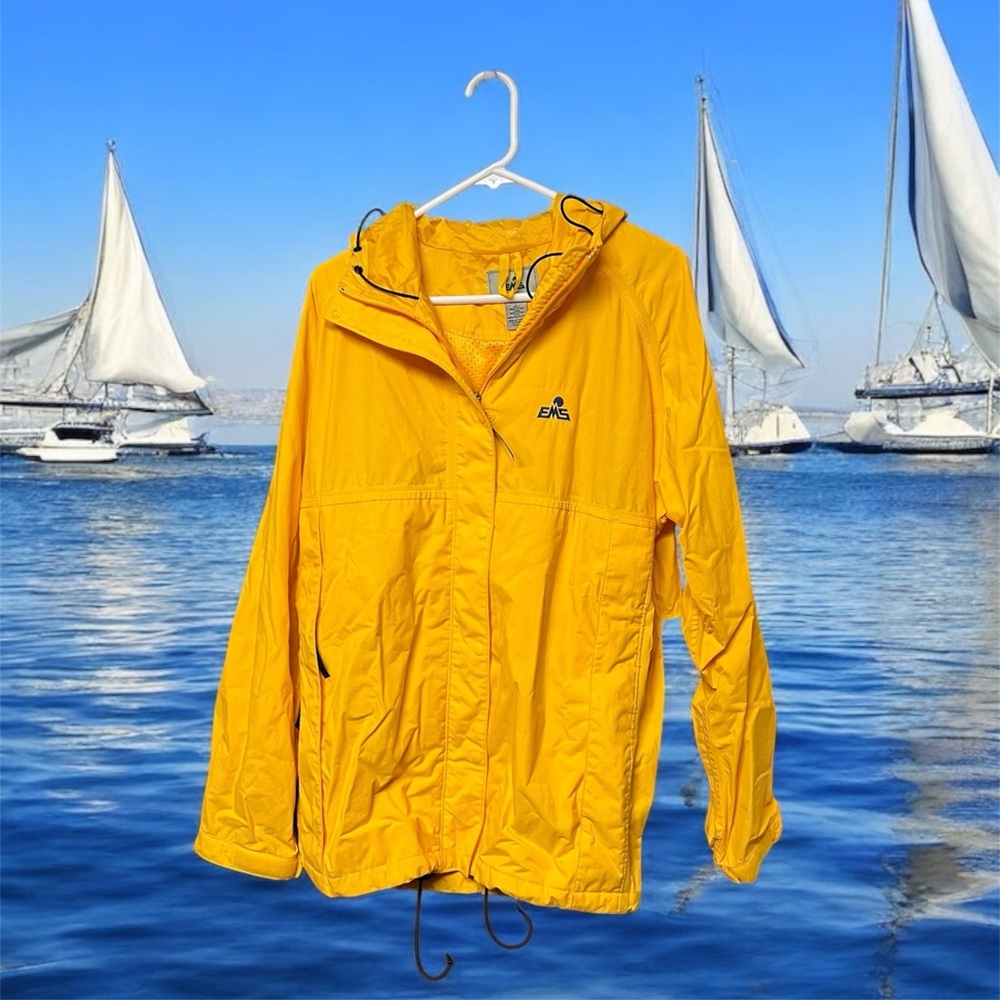 ⛵️EMS: Women’s size L, yellow hooded sailing jacket with pockets, preowned.